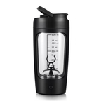 A black portable Mega Mixer with a transparent window showing the mixing mechanism and measurement markings on the bottle.